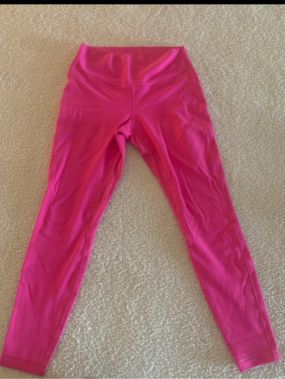 Women’s lululemon hot pink leggings 
Like new, smoke free home, size 10